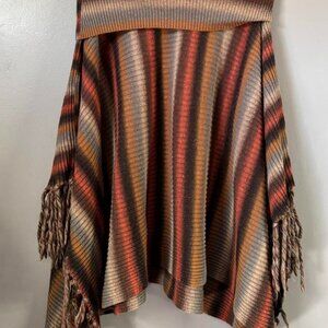 Striped sweater poncho with tassels